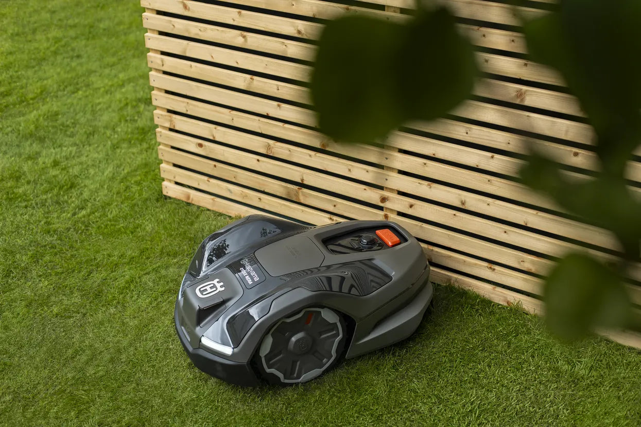 Husqvarna Automower 410XE NERA Robotic Lawn Mower 970654406 Near a Fence