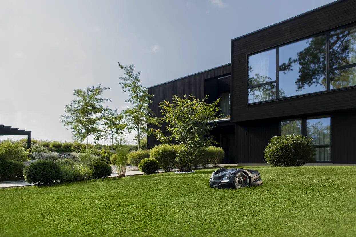 Husqvarna Automower 410XE NERA Robotic Lawn Mower 970654406 On The Lawn