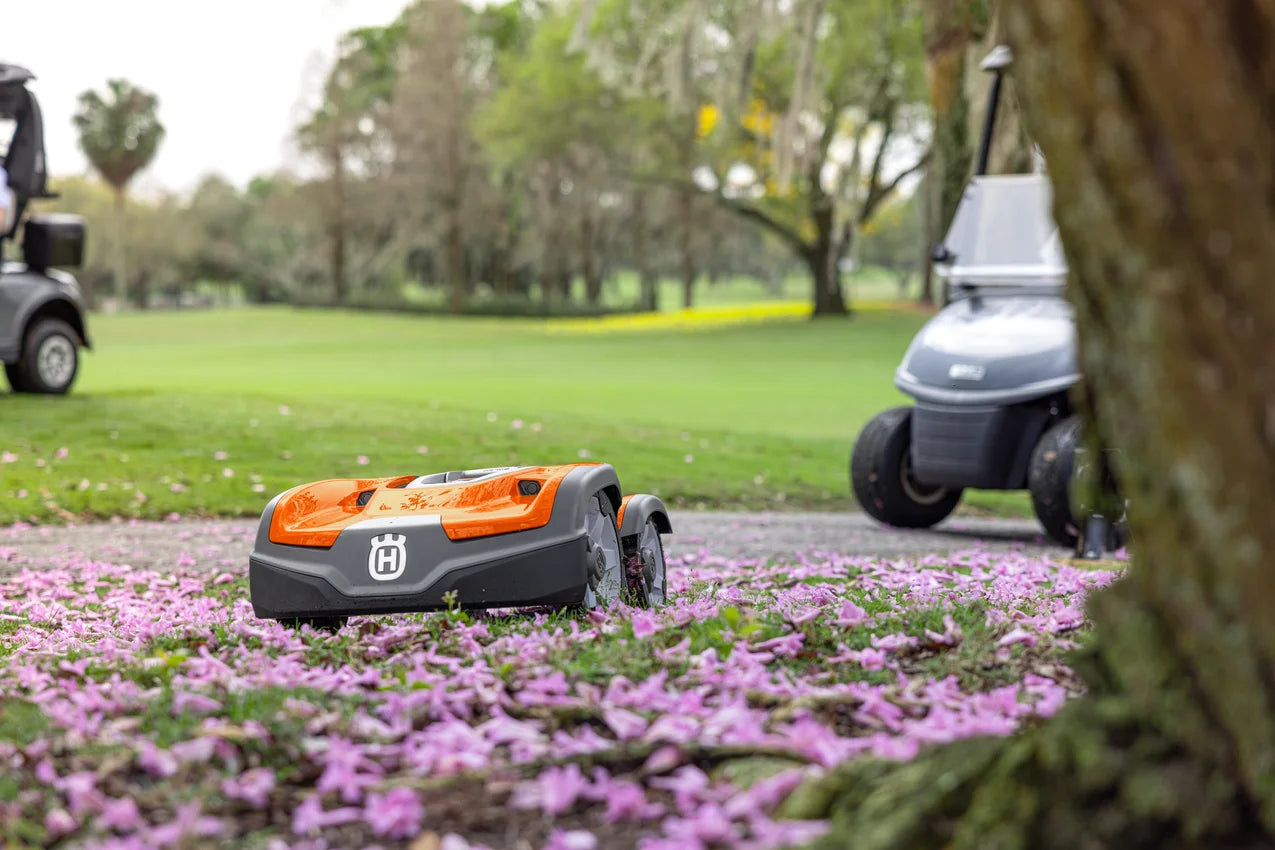 Husqvarna Commercial Automower 535X AWD robotic lawn mower on a golf field mowing