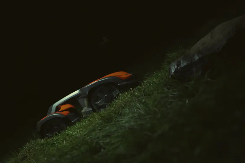 Husqvarna Commercial Automower 535X AWD robotic lawn mower on a steep slope