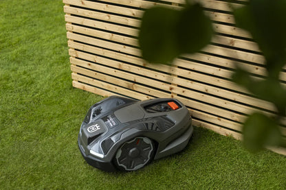 Husqvarna Automower 410XE NERA Robotic Lawn Mower 970654406 Near a Fence