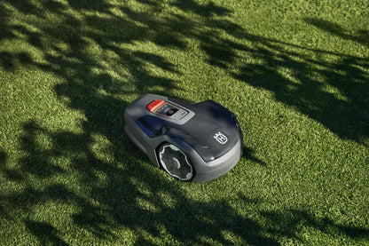 Husqvarna Automower Aspire R4 robotic lawn mower on a lawn